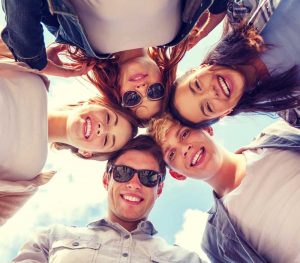 group of teen smiling