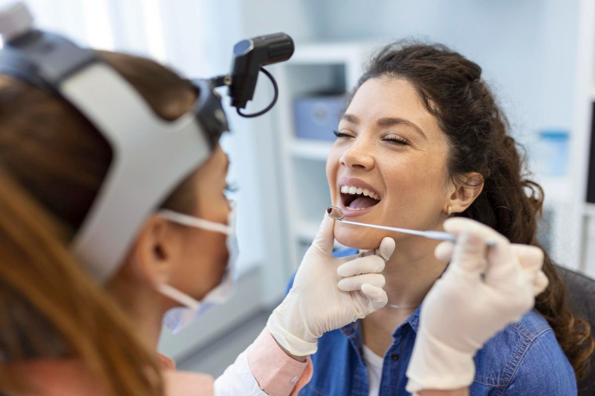A patient being examined which is step one in orthodontic treatment plans